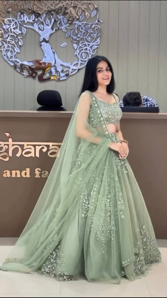 Pista Green Color Butterfly Net Coding With Sequence Work Lehenga Choli