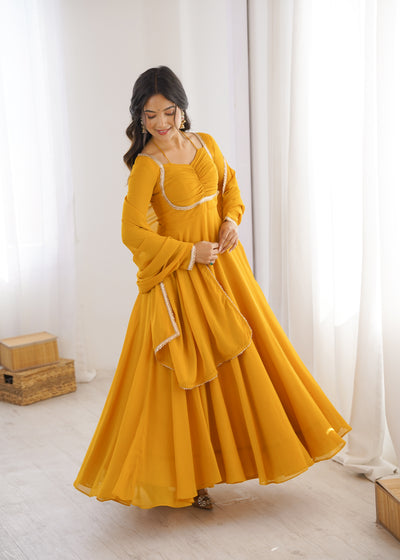 Haldi Function Wear Faux Georgette Long Gown With Dupatta