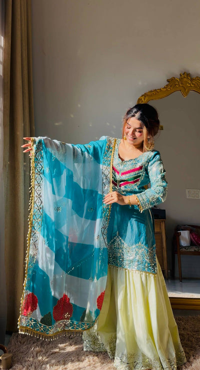 Sky Blue Color Top With Off White Sharara And Multi Color Dupatta
