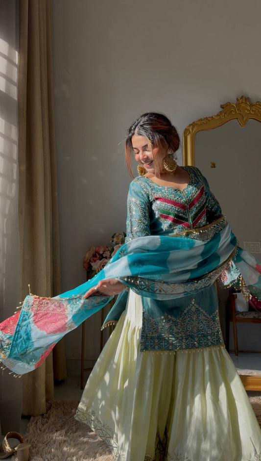 Sky Blue Color Top With Off White Sharara And Multi Color Dupatta
