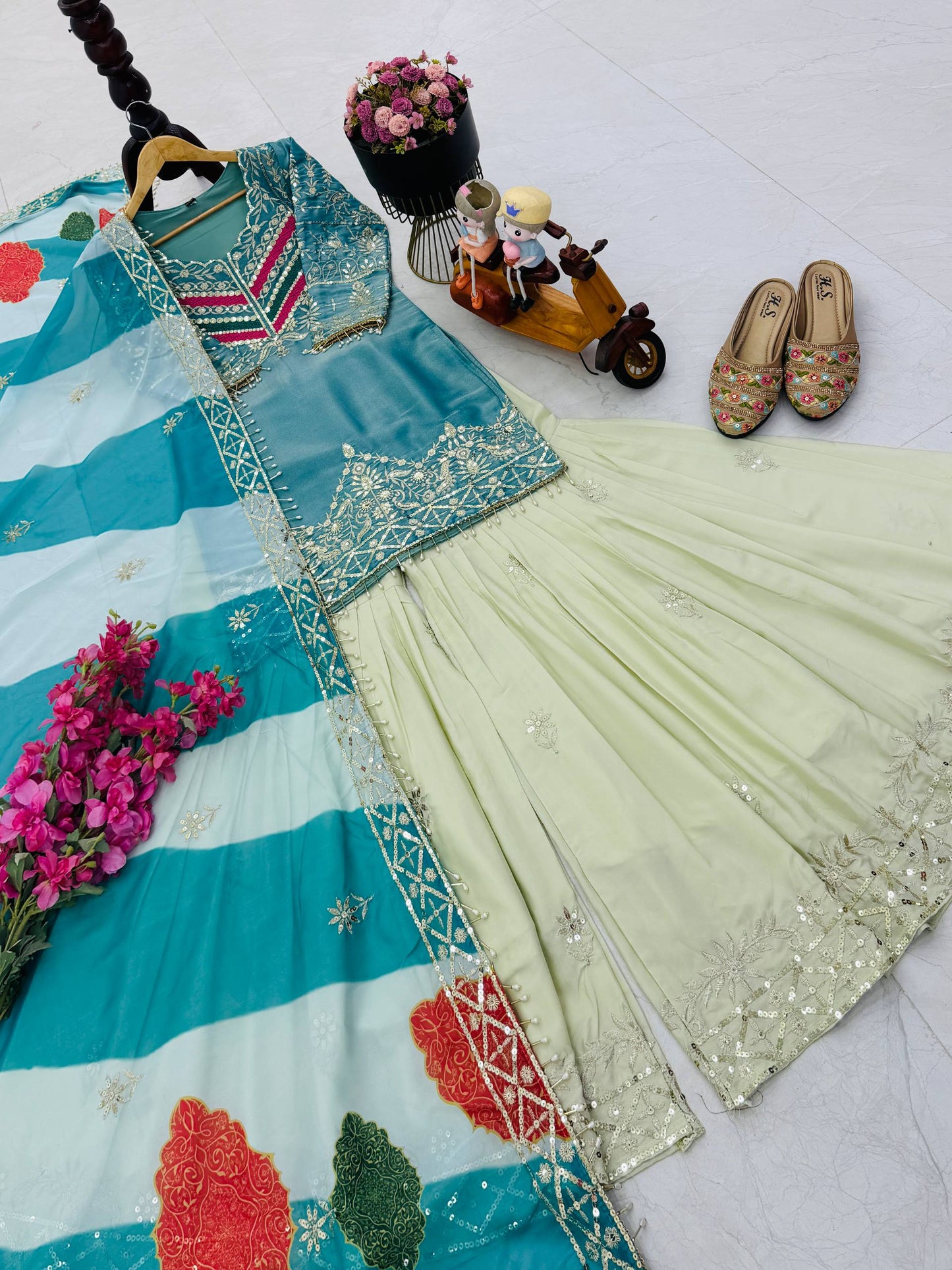 Sky Blue Color Top With Off White Sharara And Multi Color Dupatta