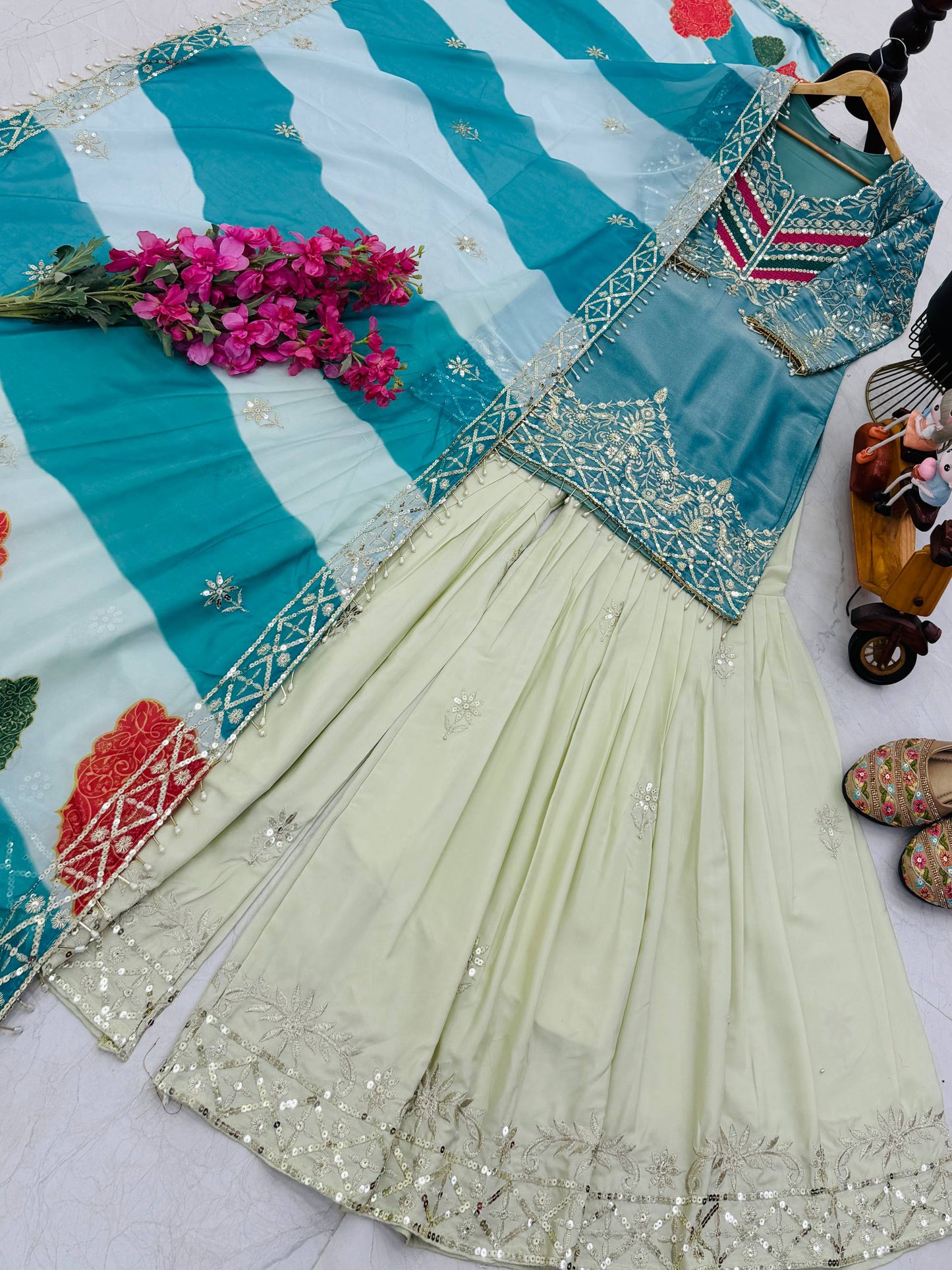 Sky Blue Color Top With Off White Sharara And Multi Color Dupatta