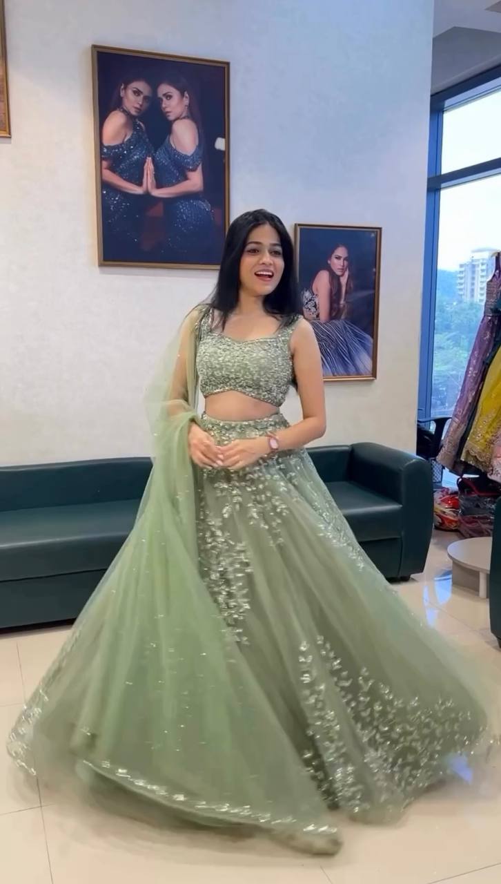 Pista Green Color Butterfly Net Coding With Sequence Work Lehenga Choli