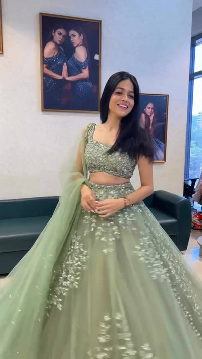 Pista Green Color Butterfly Net Coding With Sequence Work Lehenga Choli