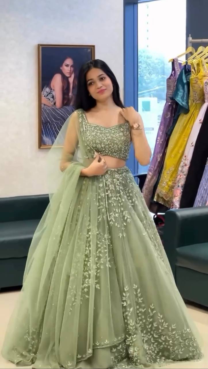 Pista Green Color Butterfly Net Coding With Sequence Work Lehenga Choli