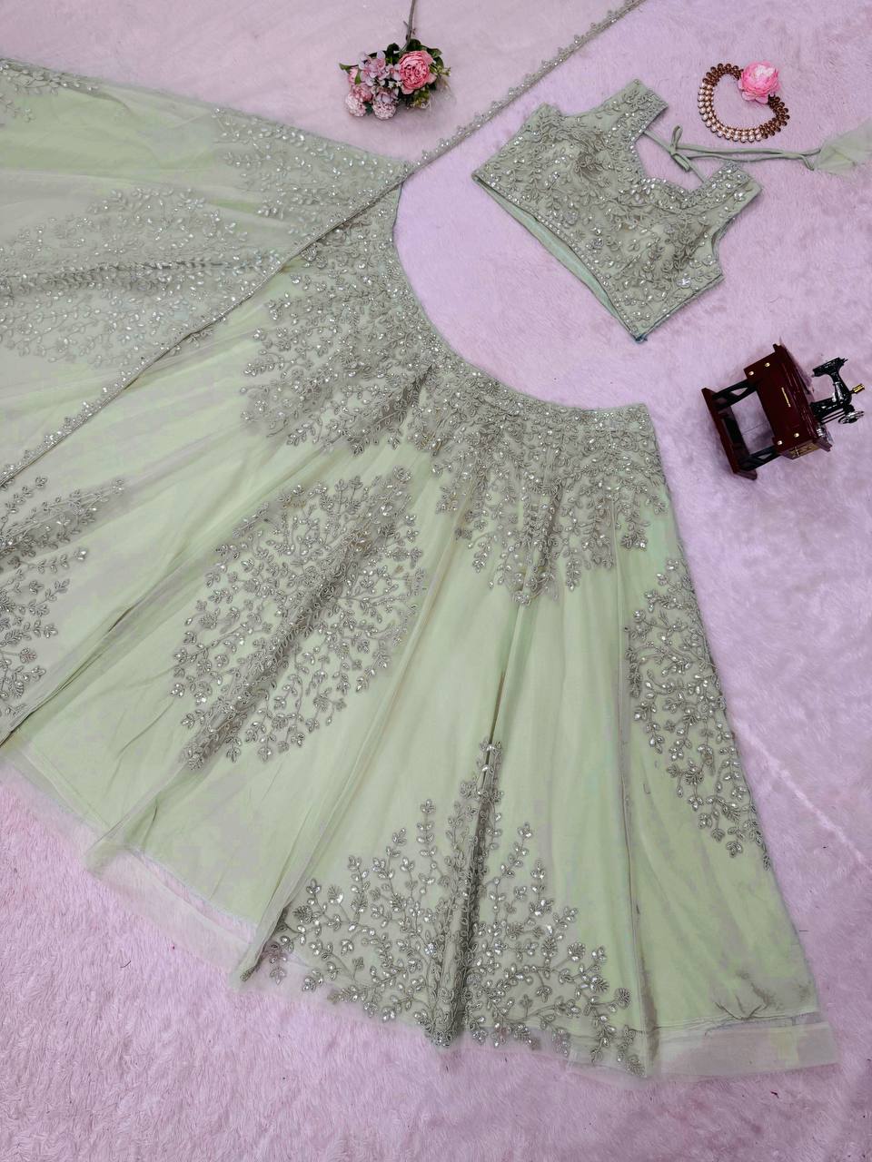 Pista Green Color Butterfly Net Coding With Sequence Work Lehenga Choli