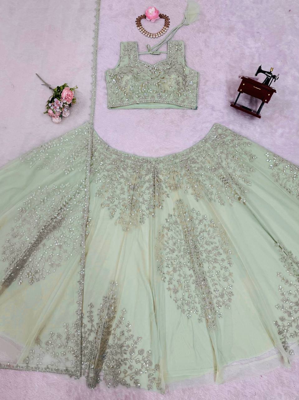 Pista Green Color Butterfly Net Coding With Sequence Work Lehenga Choli