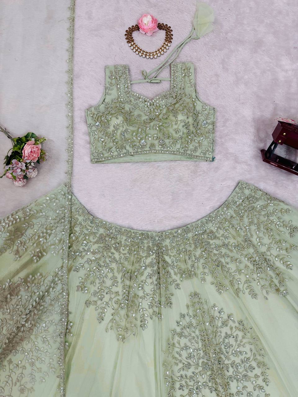 Pista Green Color Butterfly Net Coding With Sequence Work Lehenga Choli